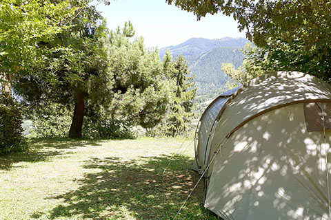 pitch tent campsite isere french alps view mountain valley